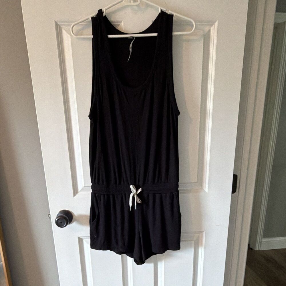 VUORI Lux Rib Short Jumpsuit Romper Black Drawstring Waist Pockets Womens M EUC